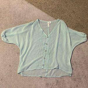 See through teal shirt